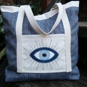 Handpainted evil eye on tote bag made by 4 Keyps