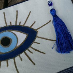 handpainted evil eye zip pouch with blue tassels