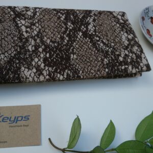 woven python design, foldover clutch bag.